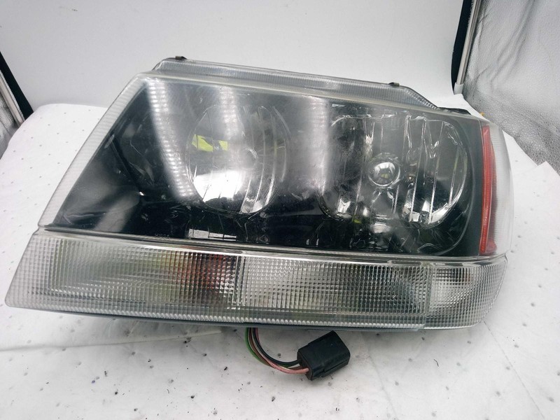 2004 Jeep Grand Cherokee Left Headlight Assembly Blue 491427 Used 230K Miles