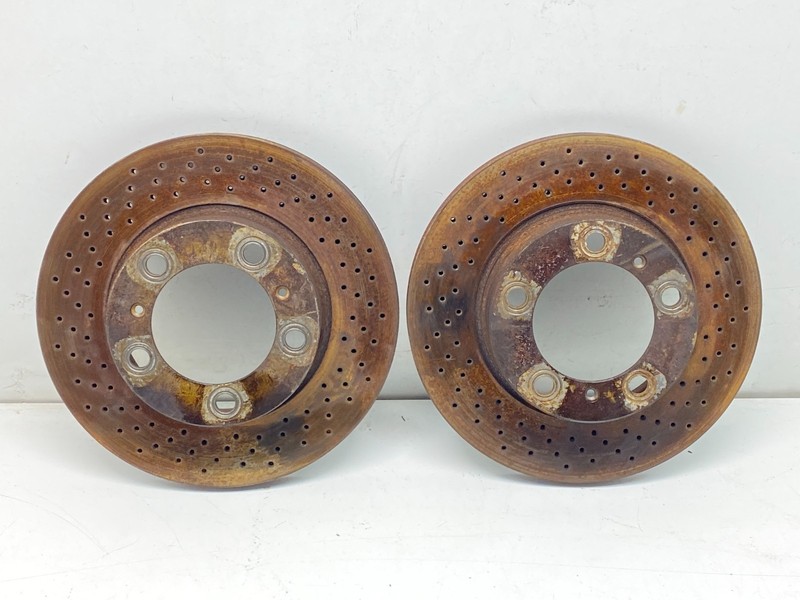 05-12 Porsche Boxster Cayman Rear Left & Right Drilled Brake Rotor Disc Set OEM✅