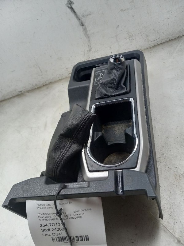 17 TOYOTA TACOMA CENTER CONSOLE SHIFTER BEZEL WITH CUP HOLDERS