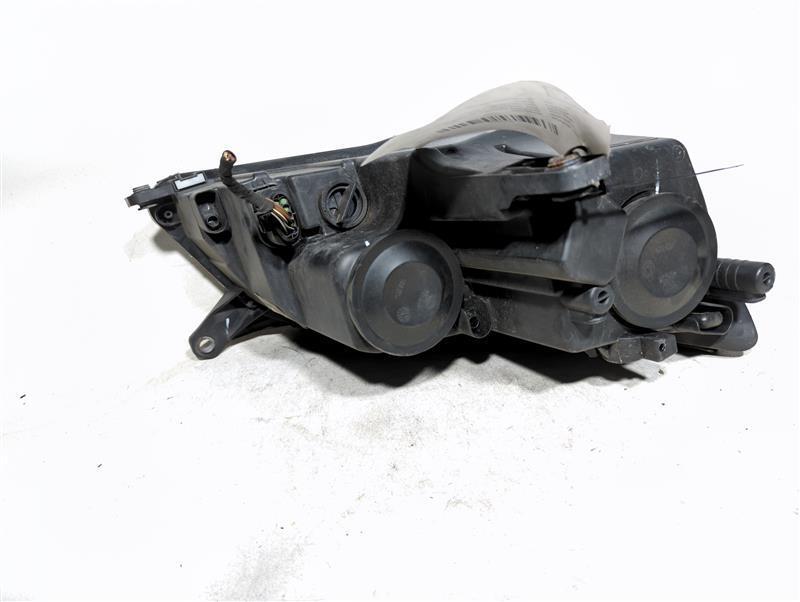 2009 Volkswagen Tiguan Left Halogen Headlight Assembly 253667 - Used
