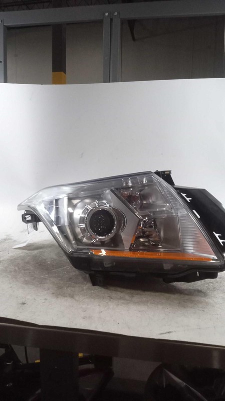 Used Left Headlight Assembly fits: 2015 Cadillac Srx halogen Left Grade B