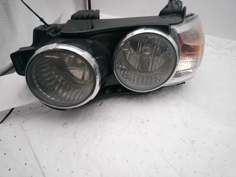 2012 Chevrolet Sonic Left Headlight Assembly Red 257824 Used 116K Miles