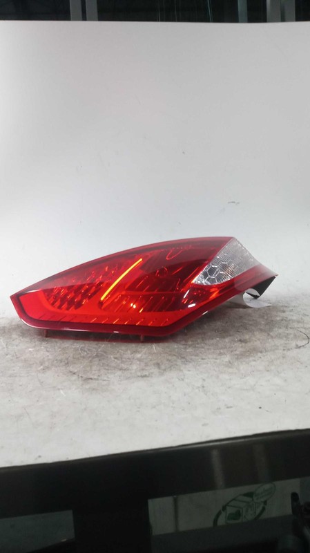 Used Left Tail Light Assembly fits: 2013 Ford Fiesta 4 Dr Htbk Left Grade A