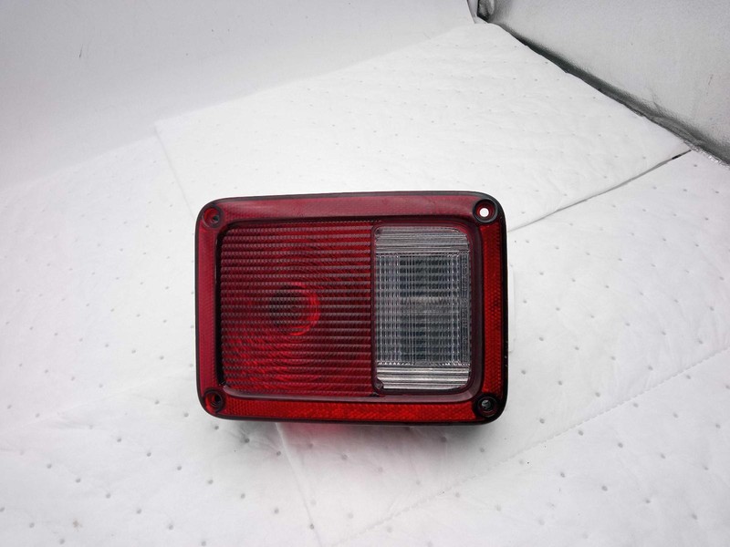 Used Left Tail Light Assembly fits: 2011 Jeep Wrangler Left Grade B