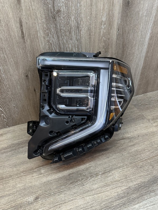 2022-23 GMC SIERRAAT4LH HEALIGHT ASSY OEM PART # 85049924