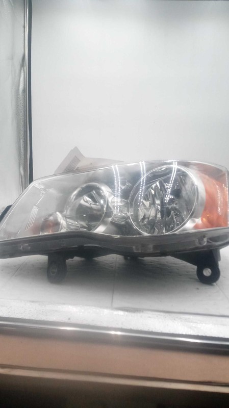 2012 Chrysler Town & Country Left Headlight Assembly Silver 710044 Used