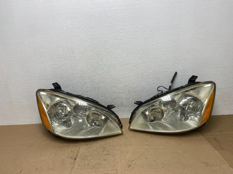 2002 to 2004 Nissan Altima Left+Right Side Set Halogen Headlights AE6886 DW