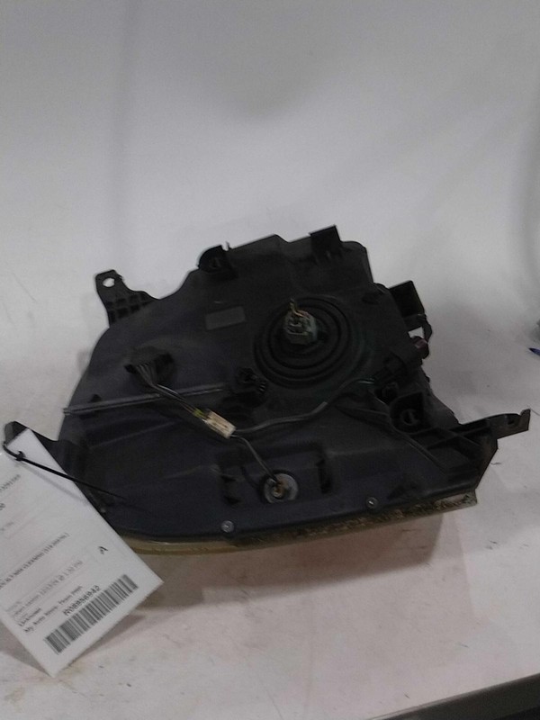 2007 GMC Yukon XL 1500 Left Headlight Assembly Gold 510013 Used Parts