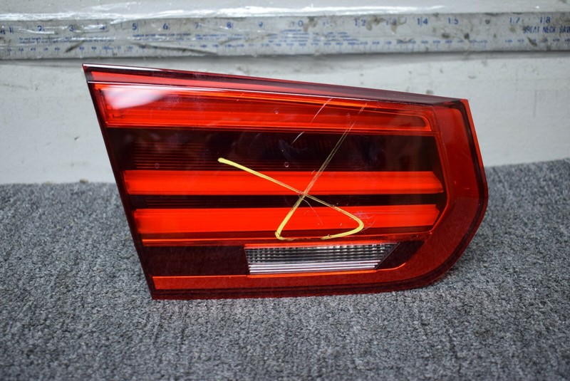 2016-2018 BMW 3 SERIES INNER TAIL LIGHT DRIVER SIDE OEM H7736912107