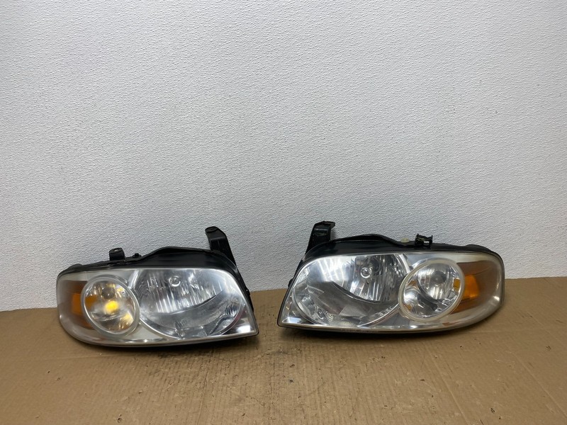 2004 - 2006 Nissan Sentra Halogen Left+Right Headlights AB8409 DW