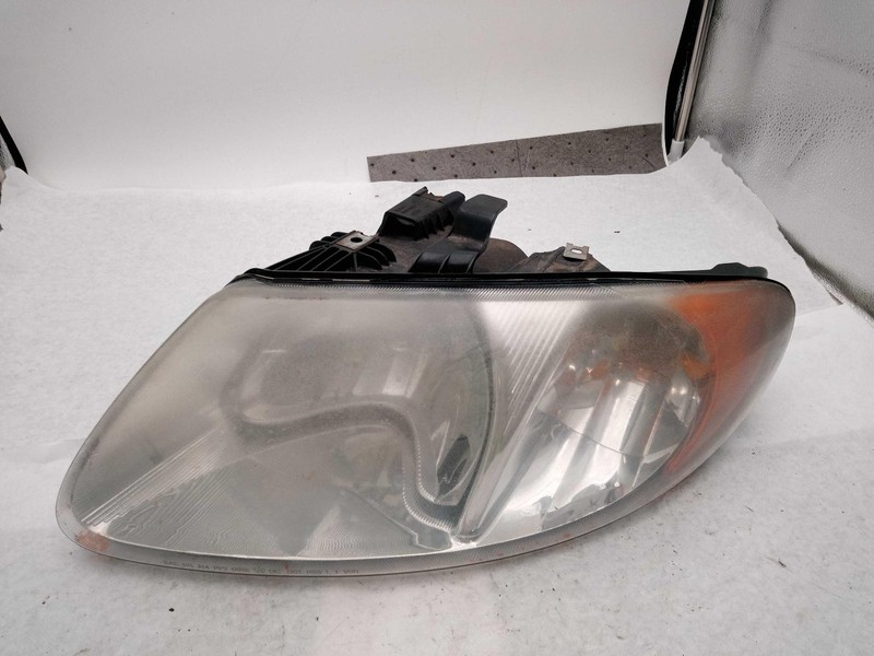 Used Left Headlight Assembly fits: 2003 Dodge Caravan SWB 113`` WB Left Grade C
