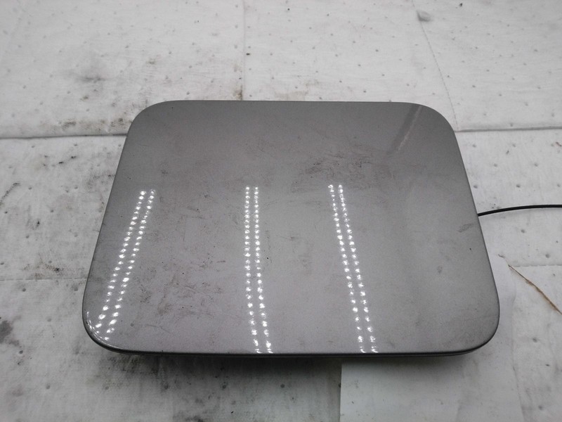2012 Nissan Quest Fuel Filler Door Grey Used OEM Part #5053985 134K Miles