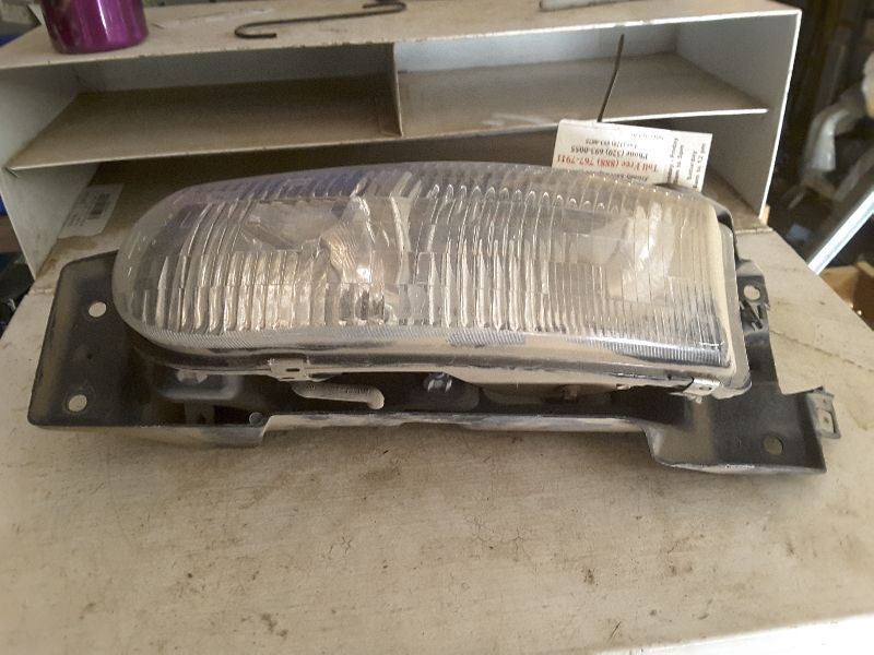 95 96 RIVIERA L. HEADLIGHT W/BLACK TRIM ON LENS 65206
