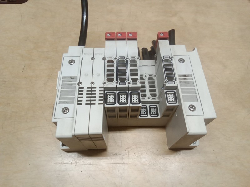 SMC SS5Y31-E4R057 Manifold Block W/ 4 SY30M-50-1A Space Assembly