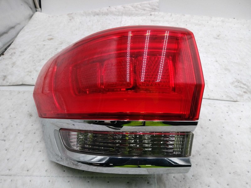Used Left Tail Light Assembly fits: 2015 Jeep Grand cherokee quarter panel mount