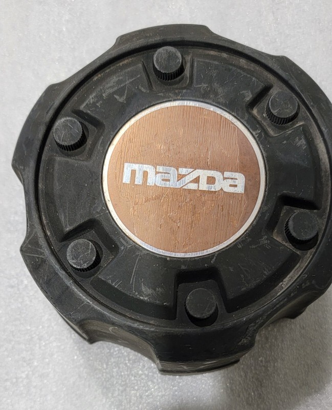 Mazda b2600 4x4 center cap for rear wheels or front 2wd trucks