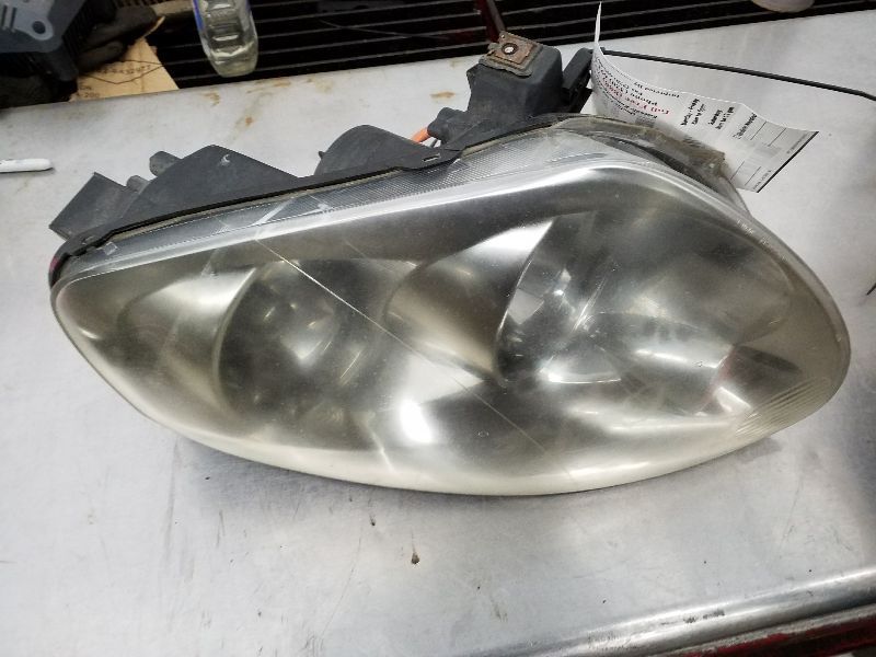 Driver Headlight Xenon HID 4 Door Sedan Fits 03-04 INFINITI G35 175944