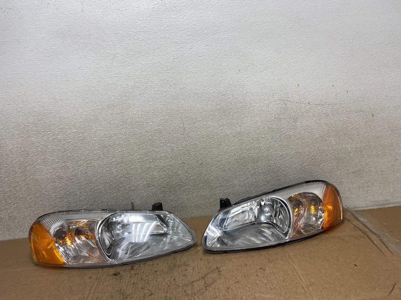 2001 to 2002 Chrysler Sebring Left+Right Side Headlights Z1055 DW