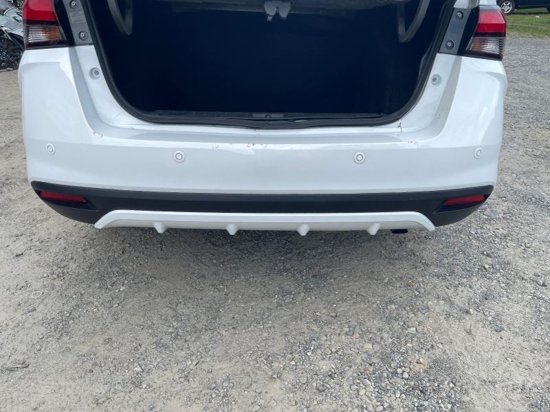 2023 NISSAN VERSA REAR BUMPER COVER WHITE PC:QM1 1.6L AT FWD 32K -SV- 56430
