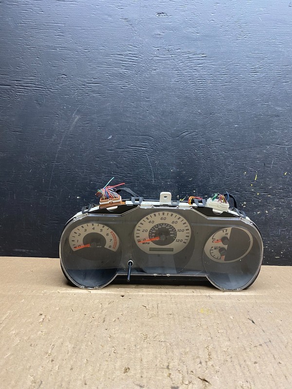 2003 to 2004 Nissan Xterra Frontier Speedometer Cluster Gauge OEM T5834 DG