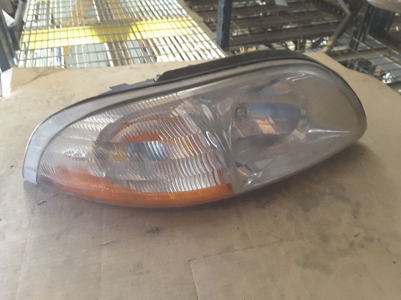 99 00 WINDSTAR R. HEADLIGHT 15050
