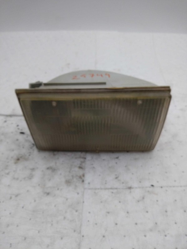 1993 Lincoln Town Car Left Headlight Assembly Yellow Lens OEM 559554