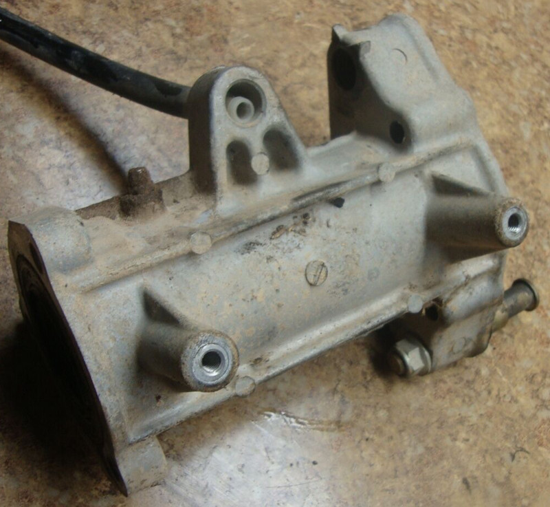 1987 Suzuki LT125 LT 125 Quadrunner Rear Drum Brake Axle Cover Back Carrier 87