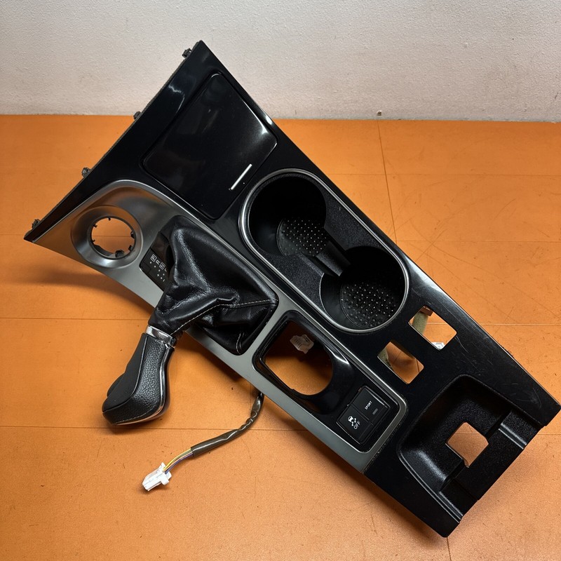 969419DJ1A | 19 - 2023 NISSAN MAXIMA CONSOLE SHIFTER TRIM BEZEL W/CUP HOLDER OEM