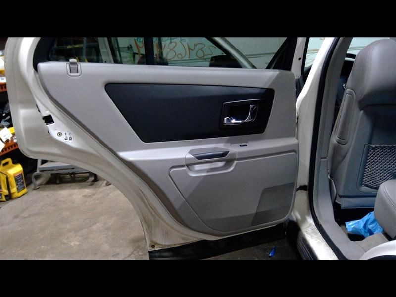 2006 SRX Driver Left Rear Door Trim Panel Gray 1304930