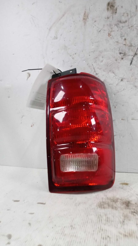 Used Right Tail Light Assembly fits: 1997 Ford Expedition w/o metallic coated bo