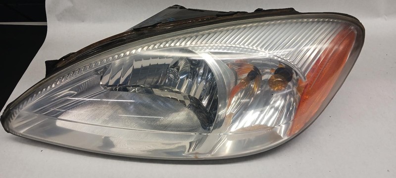 00-'07 FORD TAURUS Left driver headlight OEM Grade B