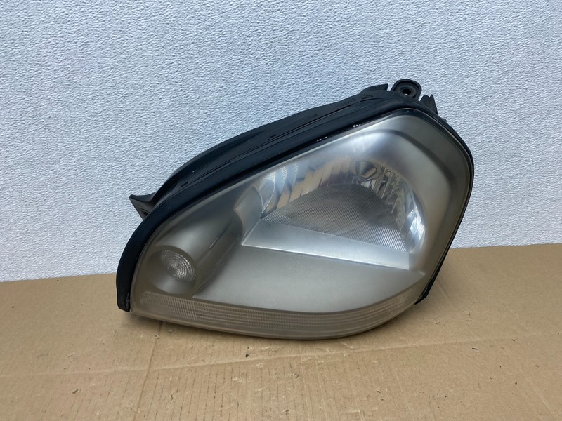 2005 to 2008 Hyundai Tucson Left Driver LH Side Headlight TYC AB8107 DW