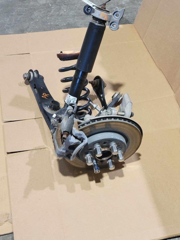 2017-2024 Cadillac XT5 RH Passenger Rear Knee Suspension Assmebly W/ Spring OEM