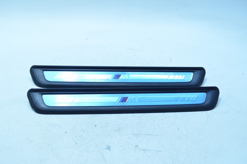 22-24 BMW i4 G26 FRONT LEFT / RIGHT DOOR SILL SCUFF PLATE TRIM COVER SET OEM