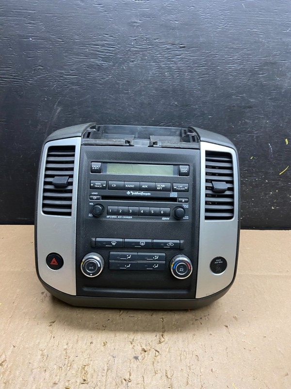 2009-2012 Nissan Frontier Xterra Radio Climate Control Bezel Center T6162 DG