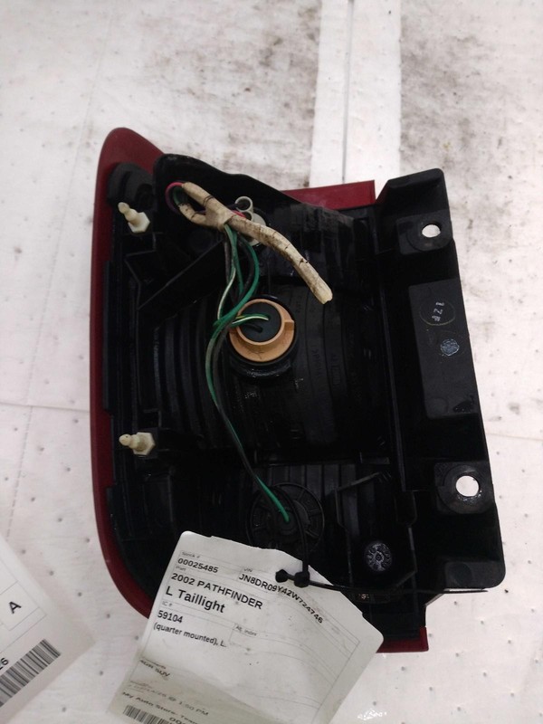 Used Left Tail Light Assembly fits: 2002 Nissan Pathfinder quarter mounted Left