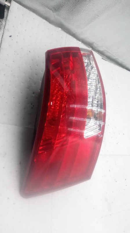 Used Left Tail Light Assembly fits: 2006 Hyundai Sonata quarter panel mounted Le