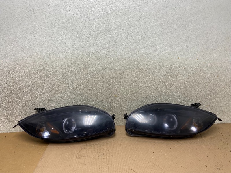2006 - 2007 Mitsubishi Eclipse Left+Right Side Halogen Headlights AA0389 DW