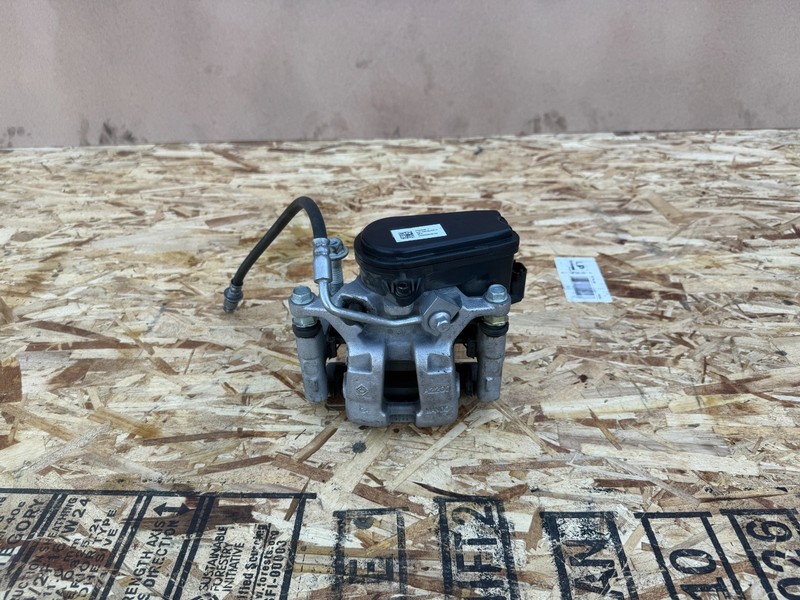 RIVIAN R1S R1T 2022-2026 OEM REAR LEFT DRIVER DISC BRAKE CALIPER ASSEMBLY