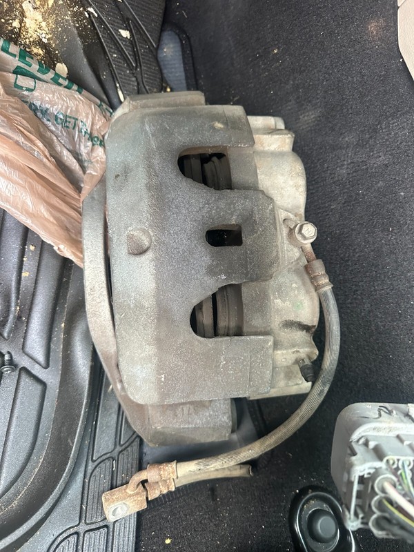 16-23 Nissan Titan NV1500 NV2500 NV3500 XD LH DRIVER SIDE FRONT BRAKE CALIPER