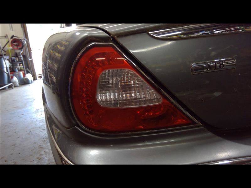 Driver Tail Light Thru VIN H01625 Chrome Bezel Fits 04-06 XJ8 1396498