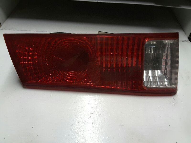 Driver Tail Light Lid Mounted Trident Manufacturer Fits 00-01 CAMRY 108329