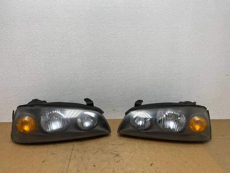 2004 to 2006 Hyundai Elantra Left+Right Set Halogen Headlights AC3577 DW