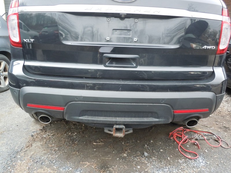 11-15 Ford Explorer Rear Bumper Cover W/ Tow Pkg Class III & Park Assist OEM UH