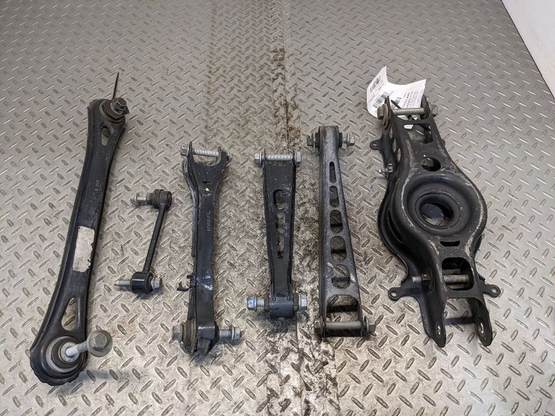 13-19 Cadillac ATS CTS REAR RIGHTLOWER CONTROL ARM SPRING PERCH OEM SET1172319