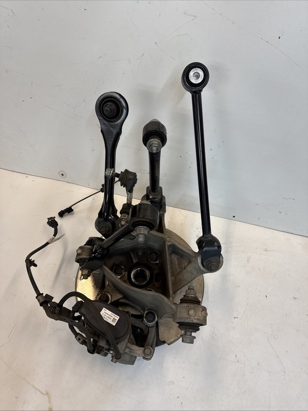 2017-2020 TESLA MODEL Y REAR LeftSPINDLE KNUCKLE HUB CALIPER SHIELD 32114