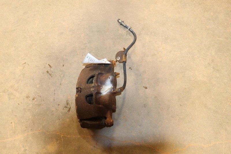 2012-2014 FORD PICKUP F150 FRONT LEFT DRIVER SIDE BRAKE CALIPER W/ HOSE OEM