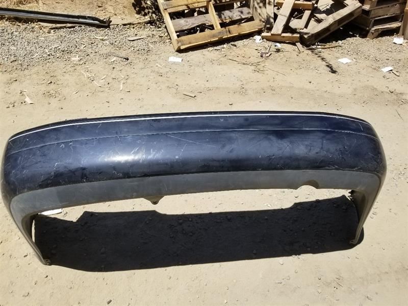 00 01 02 03 04 TOYOTA AVALON XLS REAR BUMPER ASSEMBLY BLACK SCRATCHES