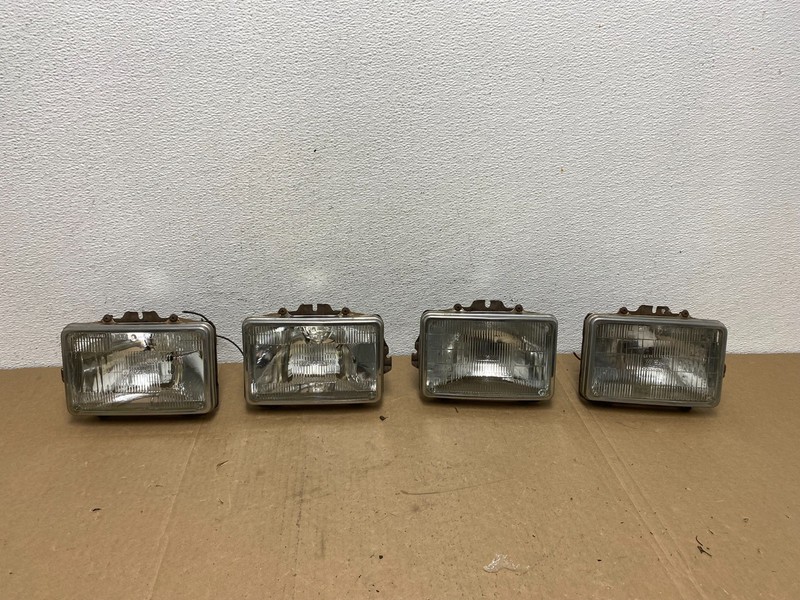 1984 to 1985 Pontiac Sunbird Left+Right Side Headlights AC5656