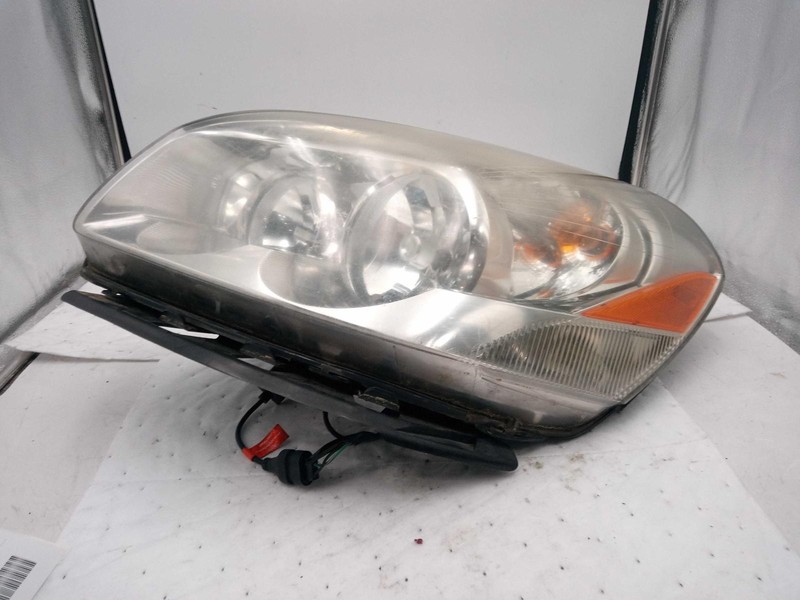 Used Left Headlight Assembly fits: 2011 Buick Lucerne Left Grade C